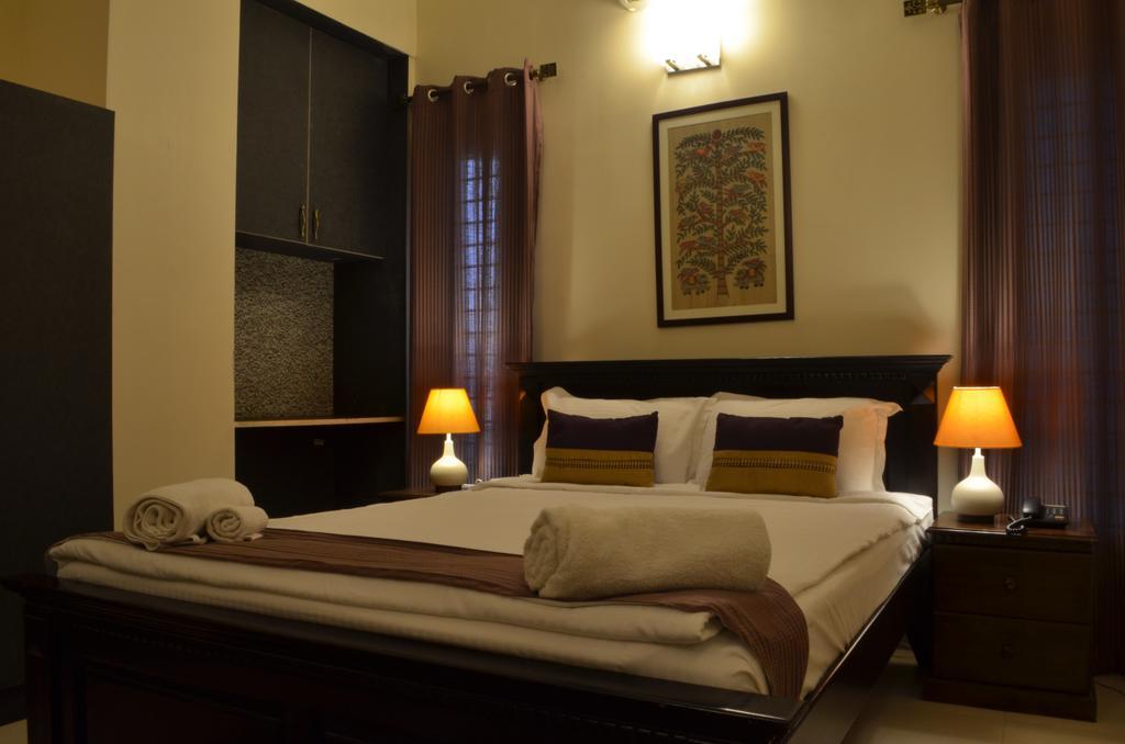 Luxtay Suites Bengaluru Pokój zdjęcie